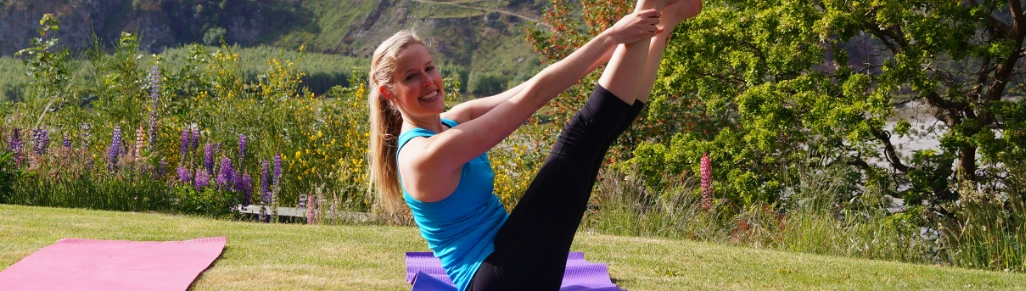 Woman practising Pilates